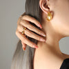 Wholesale Women's Normcore Design Cshaped Texture Electroplated 18K Gold Titanium Steel Earrings