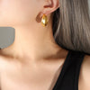 Wholesale Women's Normcore Design Cshaped Texture Electroplated 18K Gold Titanium Steel Earrings