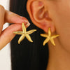 Wholesale Women's Ocean Vacation Style Exaggerated Starfish Earrings In Alloy With Electroplating