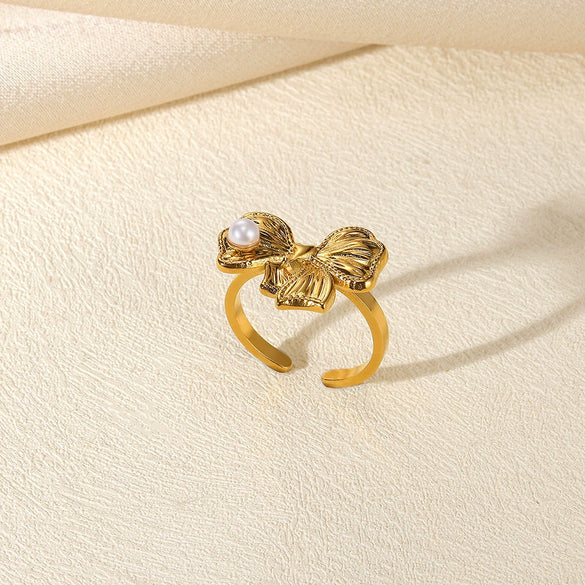 Wholesale Women's Open Ring Imitation Pearl Inlaid Stainless Steel French Retro Geometric Bow Tie Drop Shape Electroplated