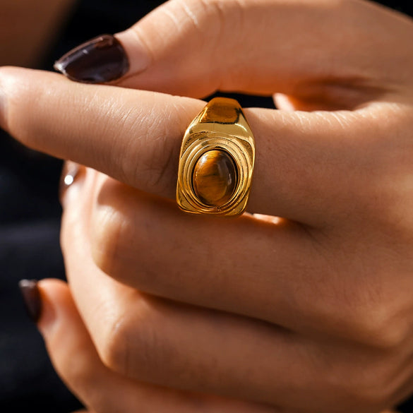Wholesale Women's Oval Tiger Eye Ring In Textured Edge Style Gold Plated Titanium Steel With Geometric Design