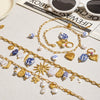 Wholesale Women's Pearl Necklace And Colorfree Titanium Steel Earrings With Ceramic Light Luxury High End Style Electroplated Jewelry