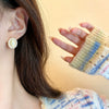 Wholesale Women's Retro Cat's Eye Pearl Alloy Earrings With Geometric Pattern And Electroplating Process