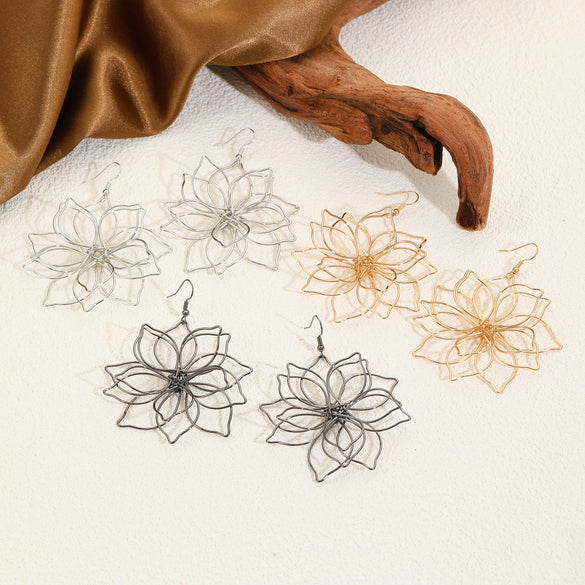 Wholesale Women's Retro Exaggerated Metal Hollow Flower Geometric Woven Earrings With Electroplating