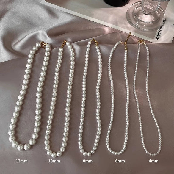 Wholesale Women's Retro French Imitation Pearl And Copper Geometric Clavicle Chain Necklace With Electroplating