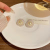 Wholesale Women's Retro French Round Alloy Geometric Earrings With Electroplating