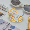 Wholesale Women's Retro Geometric Hollow Flower Open Stainless Steel Electroplated Bracelet Jewelry