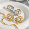 Wholesale Women's Retro Geometric Stainless Steel Electroplated Hollow Earrings With Gold And Silver Color Matching