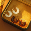 Wholesale Women's Retro Highgrade Amber Resin Geometric Ushaped Copper Electroplated Earrings