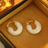 Wholesale Women's Retro Highgrade Amber Resin Geometric Ushaped Copper Electroplated Earrings