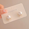Wholesale Women's Retro Light Luxury Imitation Pearl Cat Claw Earrings With Electroplating