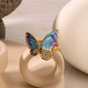 Wholesale Women's Retro Light Luxury Ring In Blue Purple Oil Drop With Diamond Butterfly Design Made Of Stainless Steel With 18K Furnace Vacuum Plating