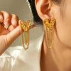 Wholesale Women's Retro Niche 316L Stainless Steel Heartshaped Hammered Tassel Chain Earrings With Geometric Pattern And Electroplating