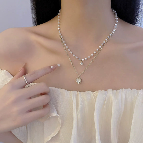 Wholesale Women's Retro Pearl Clavicle Chain Necklace Copper Geometric Heart Bow Electroplated