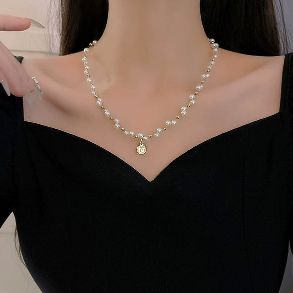 Wholesale Women's Retro Pearl Clavicle Chain Necklace Copper Geometric Heart Bow Electroplated