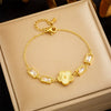 Wholesale Women's Retro Style Stainless Steel Plum Blossom Goldplated Jewelry Bracelet