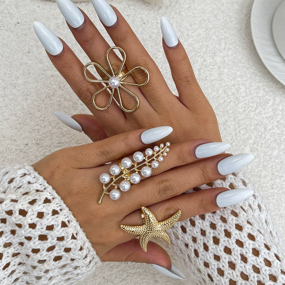 Wholesale Women's Ring Imitation Pearl Hollow Flower Geometric Electroplating
