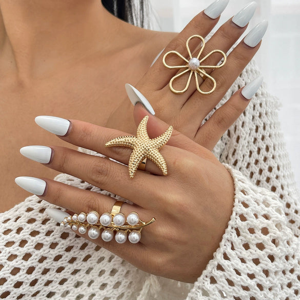 Wholesale Women's Ring Imitation Pearl Hollow Flower Geometric Electroplating