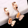 Wholesale Women's Rose Gold Titanium Steel Earrings With S925 Silver Needle Color Preservation Electroplating Rhombus Dripping Glue Design