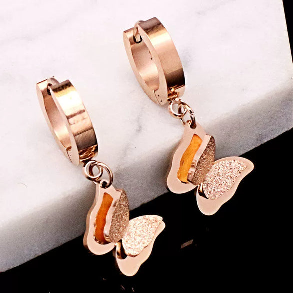 Wholesale Women's Rose Gold Titanium Steel Earrings With S925 Silver Needle Color Preservation Electroplating Rhombus Dripping Glue Design