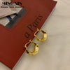 Wholesale Women's S925 Sterling Silver And Copper Irregular Earrings With Leaf Pattern And Simple Metal Design Ear Buckle