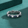 Wholesale Women's S925 Sterling Silver Heartshaped Blue Eye Zircon Ring With Dripping Glue Design