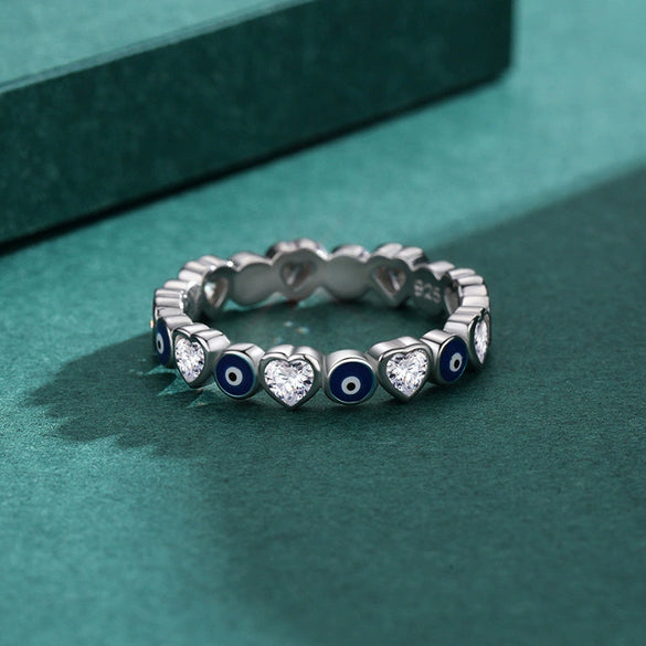 Wholesale Women's S925 Sterling Silver Heartshaped Blue Eye Zircon Ring With Dripping Glue Design