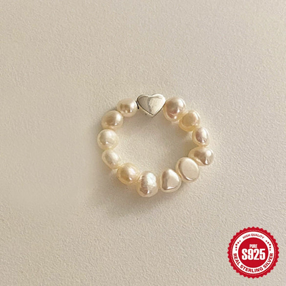 Wholesale Women's S925 Sterling Silver Love Shape Elastic Pearl Ring With Electroplating Design