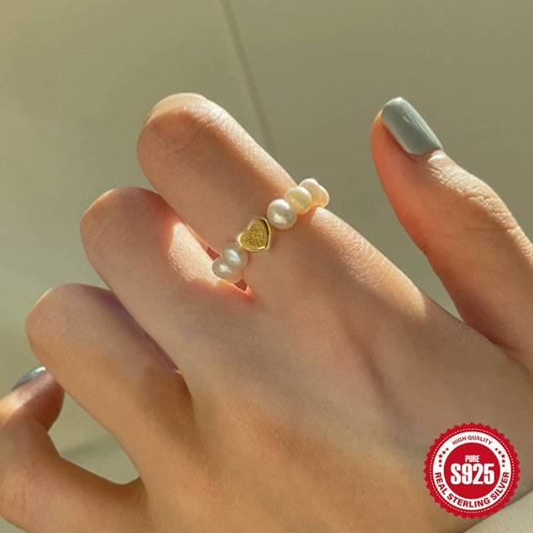 Wholesale Women's S925 Sterling Silver Love Shape Elastic Pearl Ring With Electroplating Design