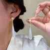 Wholesale Women's Silver Needle French Retro Water Drop Pearl Geometric Metal Electroplated Earrings
