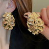 Wholesale Women's Silver Needle Hollow Flower Tassel Earrings With Real Gold Electroplating Zircon Star Pattern