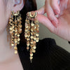 Wholesale Women's Silver Needle Hollow Flower Tassel Earrings With Real Gold Electroplating Zircon Star Pattern