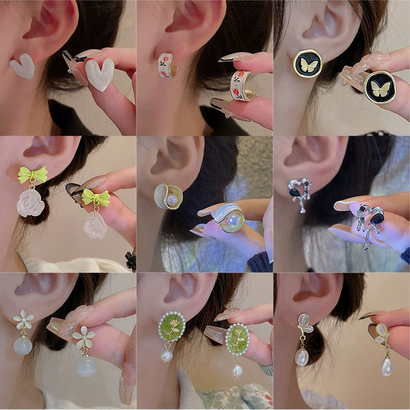 Wholesale Women's 925 Silver Needle Retro Cat's Eye Geometric Earrings With Electroplating Treatment