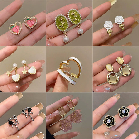 Wholesale Women's 925 Silver Needle Retro Cat's Eye Geometric Earrings With Electroplating Treatment