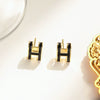 Wholesale Women's Silverplated Copper Oildrip Letter Earrings With Electroplating Process