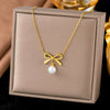 Wholesale Women's Simple Animal Style Titanium Steel Snake Bone Chain Necklace And Earrings Set With Bowknot Fake Pearls Electroplated