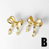 Wholesale Women's Simple Bow Geometric Copper Gold Plated Zircon Inlaid Earrings