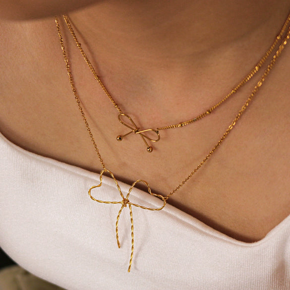 Wholesale Women's Simple Fashion Bow Geometric 18K Gold Plated Titanium Steel Necklace