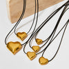 Wholesale Women's Simple Fashion Exaggerated Hollow Five Pointed Star And Heart Pendant Necklace With Wax Rope Chain Made Of Stainless Steel With Electroplating Treatment