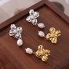 Wholesale Women's Simple Fresh Water Pearl Flower Titanium Steel Earrings With Electroplating Design