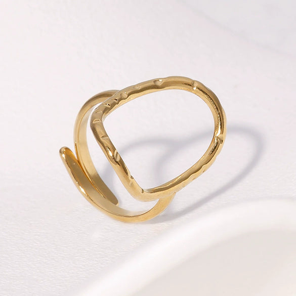Wholesale Women's Simple Geometric Stainless Steel Electroplated Hammered Oval Hollow Open Ring Jewelry