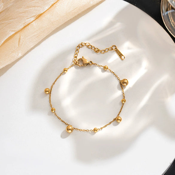 Wholesale Women's Simple Geometric Titanium Steel Electroplated Gold Beads Pea Chain Bracelet
