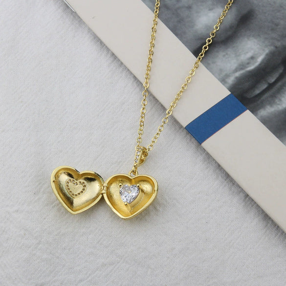 Wholesale Women's Simple Gold Plated Copper Hollow Heart Shaped Open Pendant Necklace With O Chain