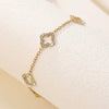 Wholesale Women's Simple Goldplated Stainless Steel Flower Fourleaf Clover Zircon Bracelet