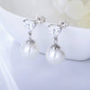 Wholesale Women's Simple Light Luxury Geometric Heartshaped Sterling Silver Zircon Earrings Inlaid With Pearls
