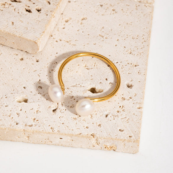 Wholesale Women's Simple Minimalist Geometric Stainless Steel Opening Ring With Pvd Furnace Vacuum Real Gold Plating And Natural Steamed Bread Pearl