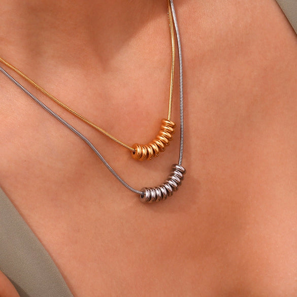 Wholesale Women's Simple Niche Explosive Pendant Necklace With Stainless Steel 18K Gold Plated Beans And Broken Silver Geometric Design