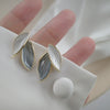 Wholesale Women's Simple Plant Flowers Style Alloy Dripping Oil Leaf Earrings