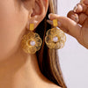 Wholesale Women's Simple Style Flowershaped Stainless Steel Electroplated Earrings