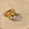 Wholesale Women's Smooth Cross Large Arc Geometric 316 Stainless Steel Ring With Electroplating Treatment